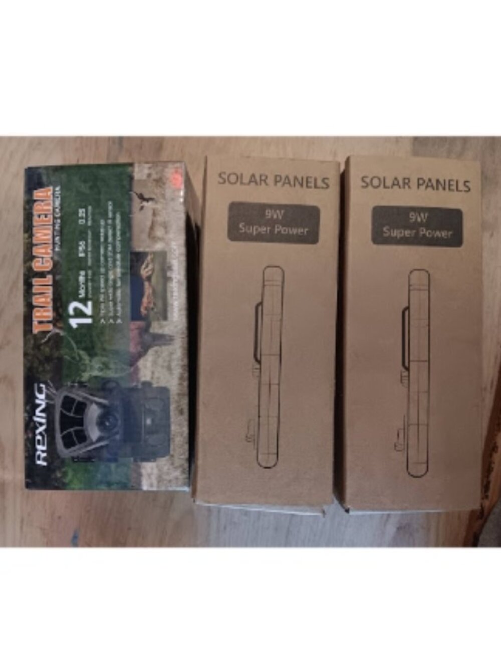 Rexing trail camera and accessories (preowned)